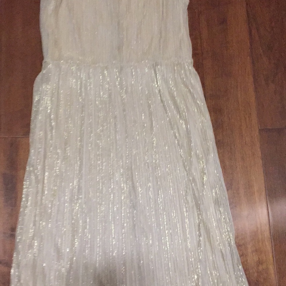 Gold pleated sleeveless dress